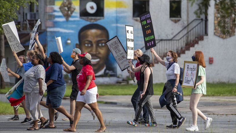 Ahmaud Arbery supporters participate in an impromptu peaceful march in Brunswick, Thursday, June 4, 2020. A judge found probable cause against 3 suspects in the Ahmaud Abrery case. The case will now be bound over to the Georgia Superior Court. (ALYSSA POINTER / ALYSSA.POINTER@AJC.COM)