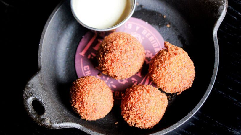 The Iberian Pig executive chef John Castellucci’s creamy and crisp turkey croquetas are a way to experience the comfort of a Thanksgiving meal the day after Thanksgiving. CONTRIBUTED BY EMILY BLACKWOOD