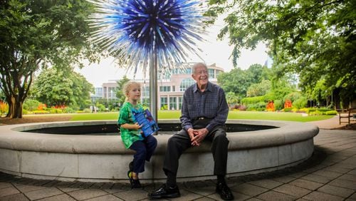 The Atlanta Botanical Garden posted this photo of Jimmy Carter and his young grandson, Errol, on its Facebook page Thursday night. According to the ABG, the former president and his wife Rosalynn, along with daughter Amy's family, took in the Chihuly Nights exhibition, followed by dinner at Linton's. Atlanta Botanical Garden/Facebook