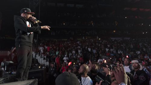 T.I. addresses the Philips Arena crowd at Saturday's V-103 "Pop Up Live" concert. (DAVID BARNES / DAVID.BARNES@AJC.COM)