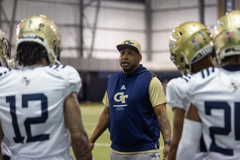 Defensive backs coach Travares Tillman talks with players during the first day of spring practice for Georgia Tech football on Thursday at Alexander Rose Bowl Field. (Photo Jenn Finch)