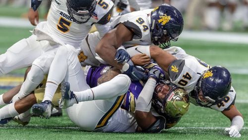 Darryl Johnson (40) getting after Alcorn State's quarterback in the Celebration Bowl at Mercedes-Benz Stadium on Saturday, December 15, 2018. North Carolina A&T won 24-22 over the Alcorn State. (Photo by N.C. A&T Sports Information)