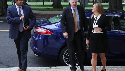 Sen. John McCain, R-Ariz., arrives for work on Capitol Hill hours after voting no on the GOP “skinny repeal' health care bill. Mark Wilson/Getty Images