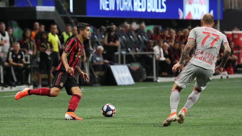 Atlanta United defender Franco Escobar (2) looks to pass while being defended by New York Red Bulls midfielder Daniel Royer (77) during the first half in a MLS game on Sunday, July 7, 2019, in Atlanta. Branden Camp/SPECIAL
