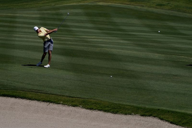 Georgia Tech golfer Bartley Forrester hits from the second fairway during the final round of the NCAA college men's match play golf championship, Wednesday, May 31, 2023, in Scottsdale, Ariz. (AP Photo/Matt York)