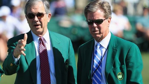 Augusta National Chairman Billy Payne, left, confers with his eventual successor Fred Ridley during the 2016 Masters.