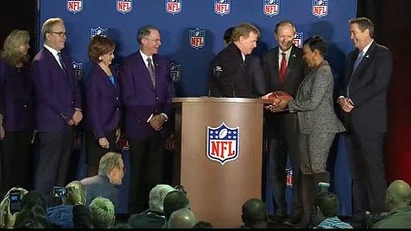Atlanta Mayor Keisha Lance Bottoms accepts the ball during the Super Bowl handoff ceremony.