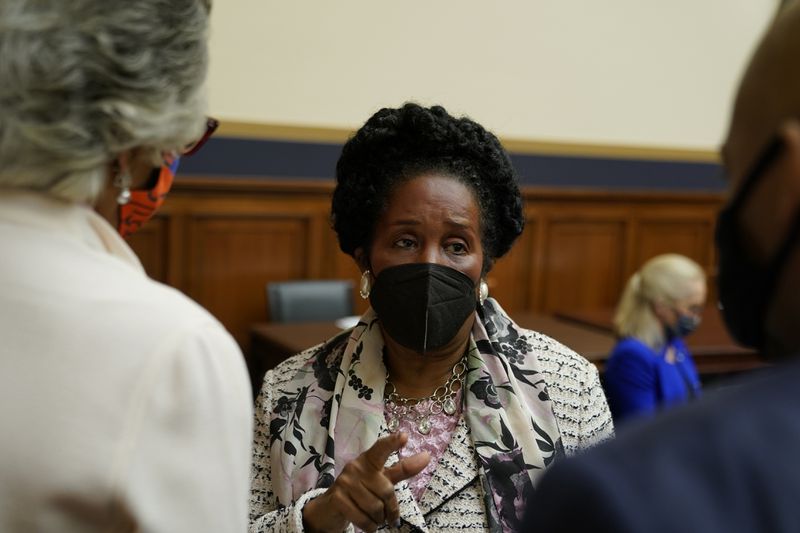Rep. Sheila Jackson Lee (D-Texas) talks with others on Capitol Hill in Washington on Wednesday. Jackson is the lead sponsor of a reparations bill first proposed in 1989 by the late Rep. John Conyers Jr. (D-Michigan). 