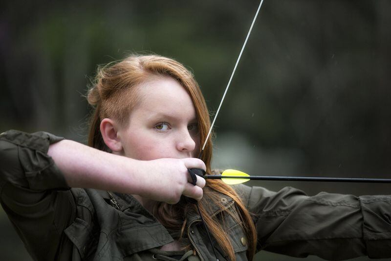 “The Hunger Games” inspired 13-year-old Emily Rose Ross to take archery lessons. She’s aiming for success with her forthcoming novel for young people, “Blue’s Prophecy.” CONTRIBUTED BY BILLY HOWARD