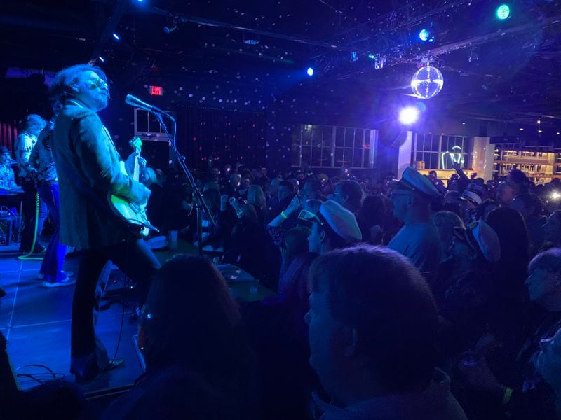 Mark "Monkeyboy" Dannells (left) during the Turkey Eve concert Yacht Rock Revue held at Venkman's in Atlanta Nov. 24, 2021. RODNEY HO/rho@ajc.com