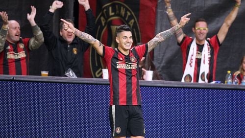 Atlanta United defender Franco Escobar and fans celebrate his goal for a 2-0 lead over the New York Red Bulls during the second half in their Eastern Conference finals MLS soccer game on Sunday, Nov. 25, 2018, in Atlanta.   Curtis Compton/ccompton@ajc.com