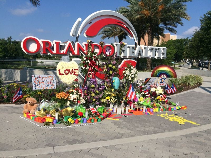 Supporters left flowers and other mementos after the 2016 shooting at the Pulse nightclub in Orlando. Photo: Jennifer Brett