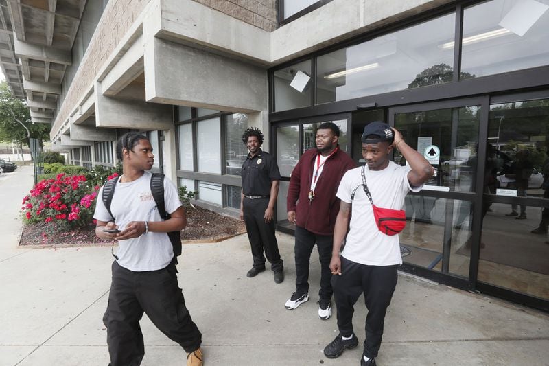 YouthBuild students on a break from classes at WorkSource Atlanta. The program exposes students to training in a range skilled trades such as carpentry, plumbing or electrical work to help the young people find jobs. Bob Andres / bandres@ajc.com