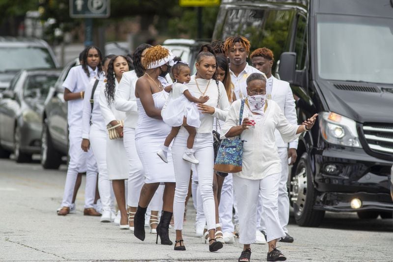 Family and friends of Rayshard Brooks arrive at Ebenezer Baptist Church before the start of his funeral service in Atlanta’s Sweet Auburn community, Tuesday, June 23, 2020. (ALYSSA POINTER / ALYSSA.POINTER@AJC.COM)