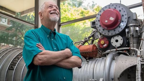 Bob Macdonald is shown in front of the Rocketdyne H-1A engine in the Daniel Guggenheim School of Aerospace Engineering at Georgia Tech, where he is currently enrolled in the university’s Online Master of Science in Analytics program. Macdonald worked for Rocketdyne in the 1960s during the Apollo program. CONTRIBUTED BY CHRISTOPHER MOORE / GEORGIA INSTITUTE OF TECHNOLOGY