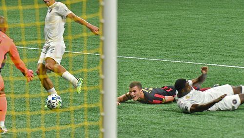September 2, 2020 Atlanta - Atlanta United defender Brooks Lennon (11) falls to the ground after he misses the shot during the second half in a MLS soccer match at Mercedes-Benz Stadium in Atlanta on Tuesday, September 2, 2020. The game ended with no score. (Hyosub Shin / Hyosub.Shin@ajc.com)
