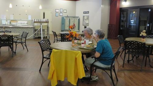 Two women enjoy lunch in Cobb Senior Services Wellness Center cafe in 2013. The cafe has been closed for three years. But it’s about to reopen to the public with Chick-fil-A of West Cobb serving breakfast and lunch.