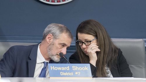 Atlanta Councilwoman Jennifer Ide (right), chair of the Finance/Executive committee, speaks with councilman Howard Shook (left), vice-chair of the committee, during a special called committee meeting to debate the creation of an Office of Inspector General. (ALYSSA POINTER/ALYSSA.POINTER@AJC.COM)