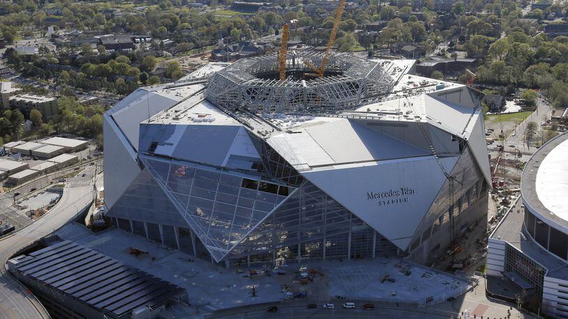 The under-construction Mercedes-Benz Stadium, shown in a March 31 aerial photo. BOB ANDRES /BANDRES@AJC.COM