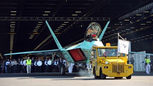 The final Lockheed Martin F-22 Raptor fighter jet is rolled off the assembly line in Marietta on Dec. 13, 2011. The aircraft was regarded as the world's premier 5th generation fighter.