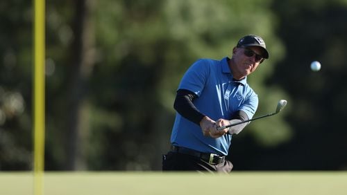 Phil Mickelson hits to the 18th green during second round of the 2024 Masters Tournament at Augusta National Golf Club, Friday, April 12, 2024, in Augusta, Ga. Jason Getz / Jason.Getz@ajc.com)
