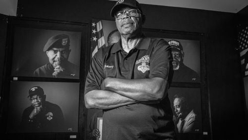 Vietnam Veteran Sgt. Johnny Miller stands in front of a series of portraits of Black Vietnam War veterans now on display at the Marietta History Center Tuesday, June 27, 2023.  (Steve Schaefer/steve.schaefer@ajc.com)