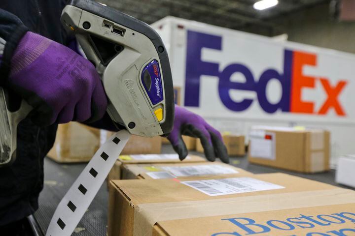 Delivery companies tackle holiday shipping