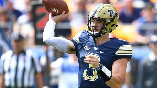 Ben Dinucci of the Pittsburgh Panthers looks to pass during the second quarter against the Oklahoma State Cowboys at Heinz Field on September 16, 2017 in Pittsburgh, Pennsylvania. (Photo by Joe Sargent/Getty Images)