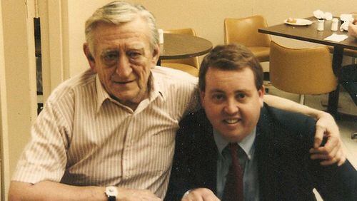 Current Hawks radio voice Steve Holman poses as a teenager with Johnny Most, the legendary voice of the Celtics. It was Most who served as a mentor to Holman, who will broadcast his 2,000th consecutive game Wednesday.