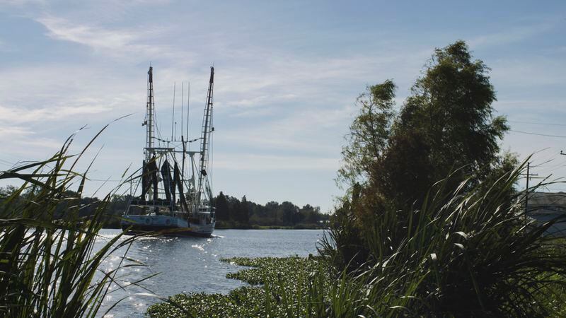 Shrimp boats travel Louisiana’s Bayou Lafourche on their way to the Gulf of Mexico.  /  Courtesy of Louisiana’s Cajun Bayou Tourism