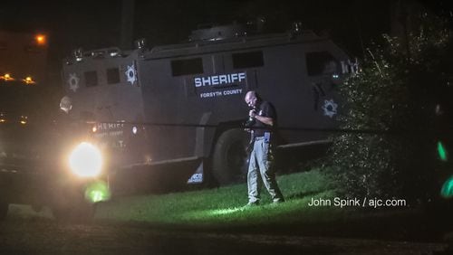 The shooting resulted from a SWAT standoff at a home on Grand Prix Street near Cumming, Forsyth County authorities said.