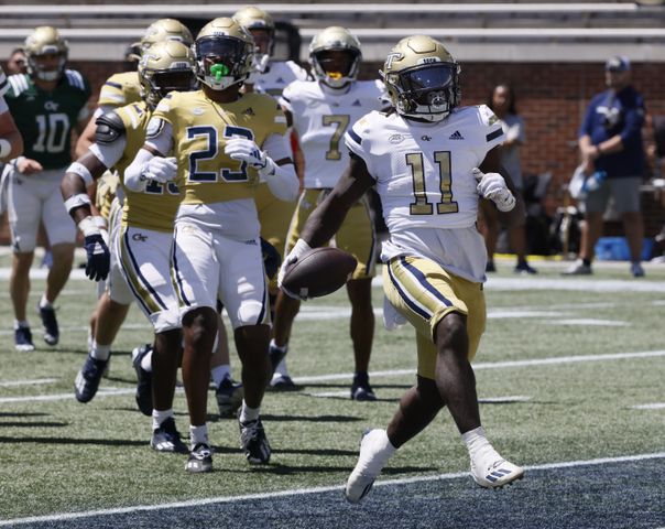 Georgia Tech running back Jamal Haynes (11) scores a touchdown in the first quarter during the Spring White and Gold game at Bobby Dodd Stadium at Hyundai Field In Atlanta on Saturday, April 13, 2024.   (Bob Andres for the Atlanta Journal Constitution)
