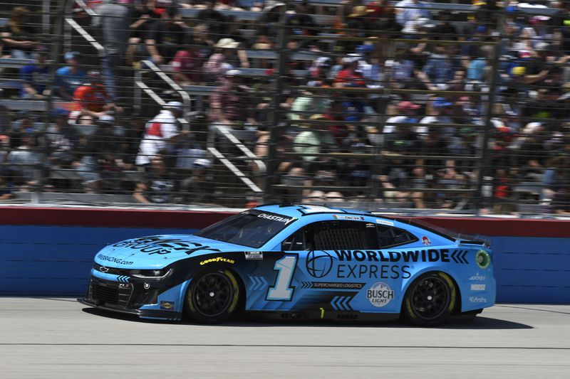 Ross Chastain (1) comes out of Turn 4 during a NASCAR Cup Series auto race at Texas Motor Speedway in Fort Worth, Texas, Sunday, April 14, 2024. (AP Photo/Randy Holt)