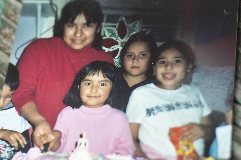 Marisela (center) and her mother, Irene (back), in a family photo. Marisela was 7 when her mother was diagnosed with cancer. CONTRIBUTED