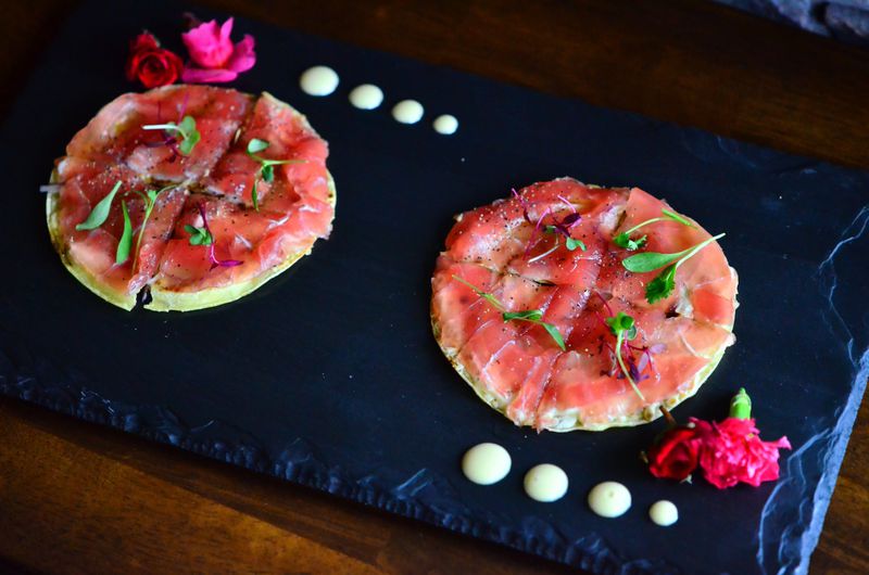Tuna Crisp with ponzu mayo, sliver sweet red onion and truffle oil. (Eight Sushi Lounge)