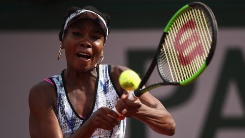 Venus Williams plays a backhand in her women's singles fourth round match against Timea Bacsinszky during day eight of the French Open at Roland Garros on June 4, 2017 in Paris, France.