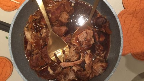 The hunt for a Boston butt among butcher shops in Israel ends with a finished dish of Japanese-style pork, braised with soy sauce, mirin, ginger and onions. CONTRIBUTED BY JOHN KESSLER