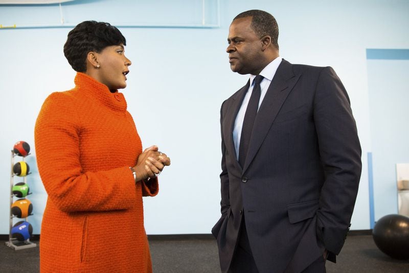 Atlanta mayoral candidate Keisha Lance Bottoms talks with current Mayor Kasim Reed at the Martin Luther King Jr. Recreation and Aquatic Center in Atlanta on Oct. 30, 2017. 