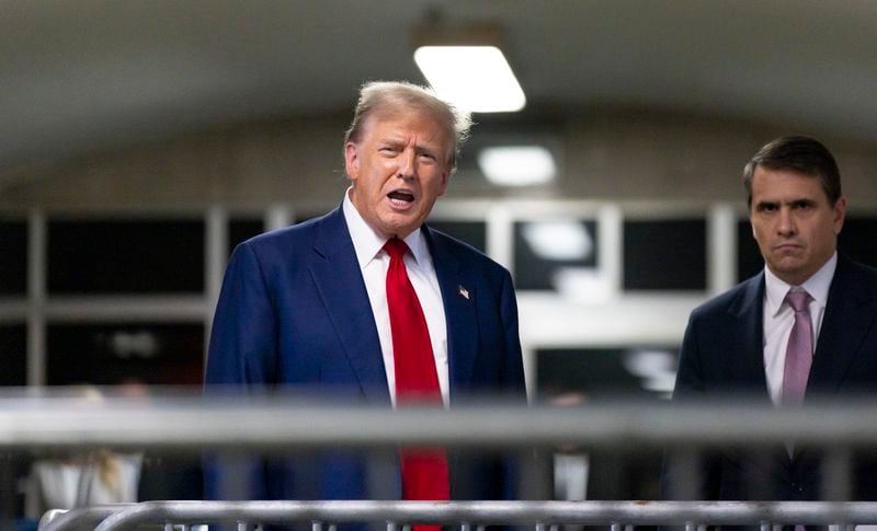 Former President Donald Trump speaks with the media as he leaves the courtroom following the day's proceedings in his trial at Manhattan criminal court in New York, Tuesday, April 30, 2024. (Justin Lane/Pool Photo via AP)