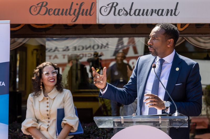 Mayor Andre Dickens announced $8.2 million in grant awards to Atlanta small businesses and nonprofits. as Dr. Eloisa Klementich, President and CEO of Invest Atlanta, looks on at the Beautiful Restaurant in Atlanta Tuesday, August 30, 2022. Steve Schaefer/steve.schaefer@ajc.com)