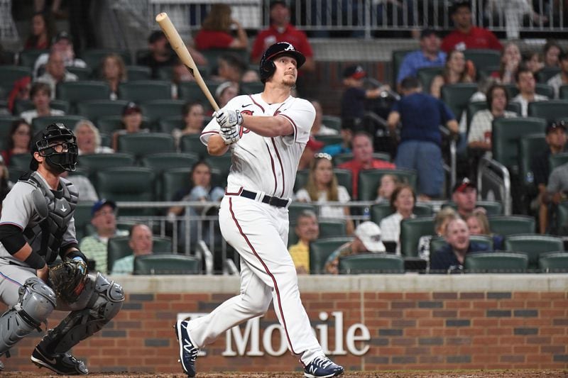 Braves' left fielder Alex Dickerson (25) hits a 2-run home run in the 4th inning at Truist Park on Saturday, April 23, 2022. (Hyosub Shin / Hyosub.Shin@ajc.com)