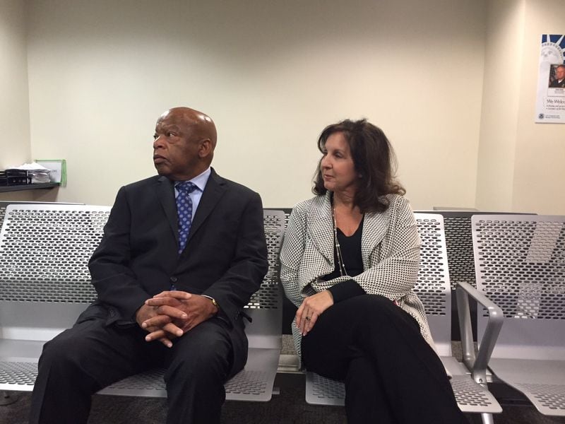 At first, a U.S. Customs and Border Protection official would not say how many people were being detained at Hartsfield-Jackson Atlanta International Airport Saturday following President Donald Trump’s executive order, U.S. Rep. John Lewis said. So Lewis turned to a gathering crowd of activists and attorneys at the airport and declared: “Why don’t we just sit down and stay a while.” JEREMY REDMON/jredmon@ajc.com