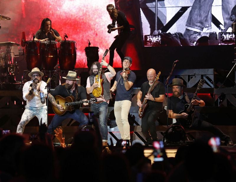 The Zac Brown Band at what was then called SunTrust Park on Saturday, June 30, 2018, on their Down the Rabbit Hole Tour. John Driskell Hopkins is on the far right. 
Robb Cohen Photography & Video /RobbsPhotos.com