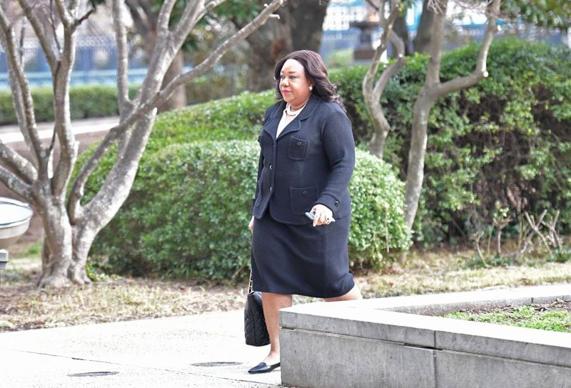 DeKalb Commissioner Sharon Barnes Sutton walks towards DeKalb County Courthouse for a hearing on February 21, 2017, related to her lawsuit challenging the constitutionality of the way some members were appointed to the DeKalb Board of Ethics. HYOSUB SHIN / HSHIN@AJC.COM