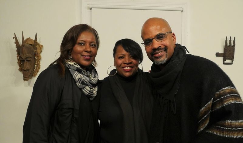 (Left to right) Journalist Ronda Racha Penrice, Hammonds House Museum executive director Leatrice Ellzy Wright and Atlanta artist Masud Olufani at the opening of Olufani’s exhibition “Translocation and Transfiguration.” Contributed by Michael Moss