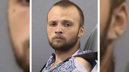 Michael Lee Cummins, 25, of Westmoreland, Tennessee, is pictured Friday, May 10, 2019, as he is booked into the Sumner County Jail following a couple of weeks in the hospital, where he was recovering after being shot by police. Cummins is accused of killing six people found beaten to death in their home Saturday, April 27, 2019, including his parents, uncle and a 12-year-old girl. Cummins is also charged in the death of a seventh person found beaten to death in her home that same day, as well as that of a man whose headless body was found near his cabin just outside Westmoreland April 17, 2019.