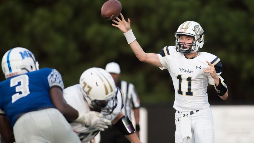 Whitefield Academy quarterback Carson Brown (11) passes the ball during the first half of a high school football game against Mount Paran Christian, Friday, Aug. 28, 2015, in Kennesaw, Ga. BRANDEN CAMP/SPECIAL