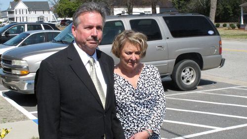 Richard and Elizabeth Jones, whose daughter was killed by a train on a Georgia movie set, speak with reporters outside the Wayne County Courthouse, Monday, March 9, 2015, in Jesup, Ga., after the film’s director and executive producer pleaded guilty to charges of involuntary manslaughter and criminal trespassing. Director Randall Miller and executive producer Jay Sedrish had just begun filming “Midnight Rider,” a movie about singer Gregg Allman, when a train plowed into their crew Feb. 20, 2014, killing camera assistant Sarah Jones and injuring six others. (AP Photo/Russ Bynum)