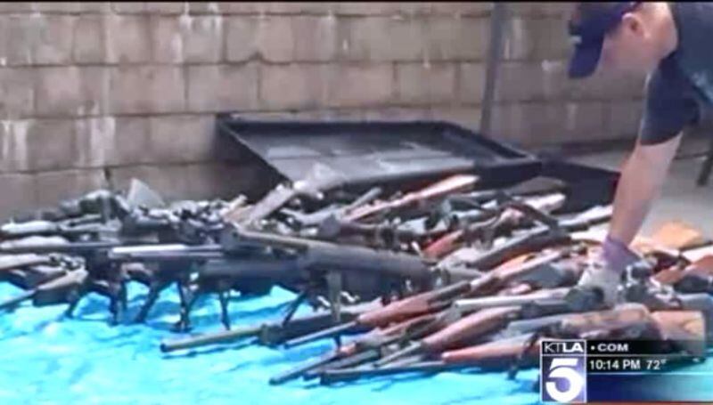 The 1,200 or so handguns, rifles and shotguns may be worth $1 million, officials say. (Image from KTLA.com video)