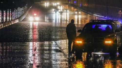 Nov. 29, 2016 Atlanta: For the first time in more than a month, metro Atlanta woke up to heavy downpours. But that rain led to flooding, standing water on local interstates and “one of the worst rush hours in recent memory,” the WSB 24-hour Traffic Center’s Mark Arum said. JOHN SPINK /JSPINK@AJC.COM